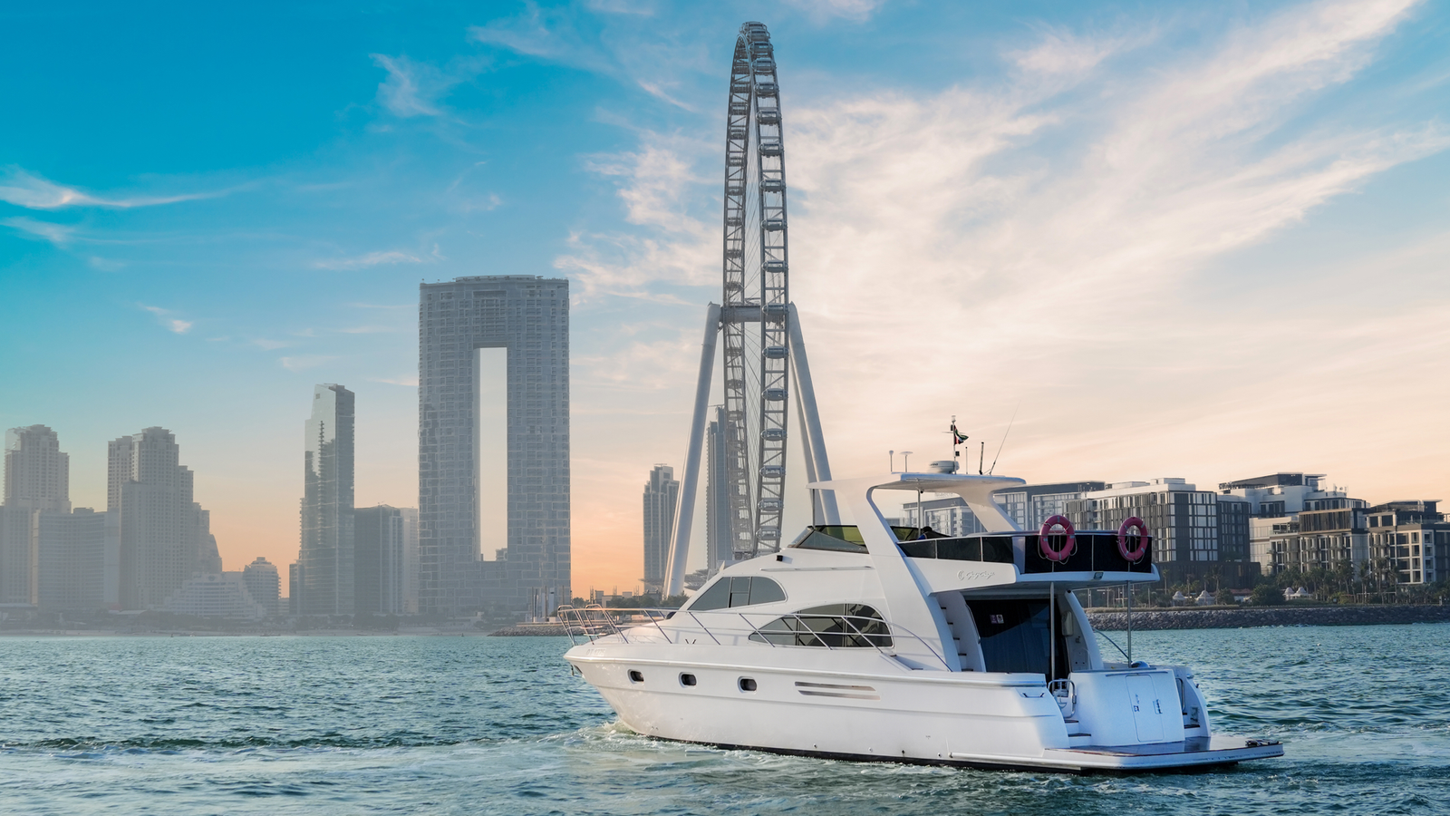 YRD Signature 55ft yacht in front of Ain Dubai Ferris wheel