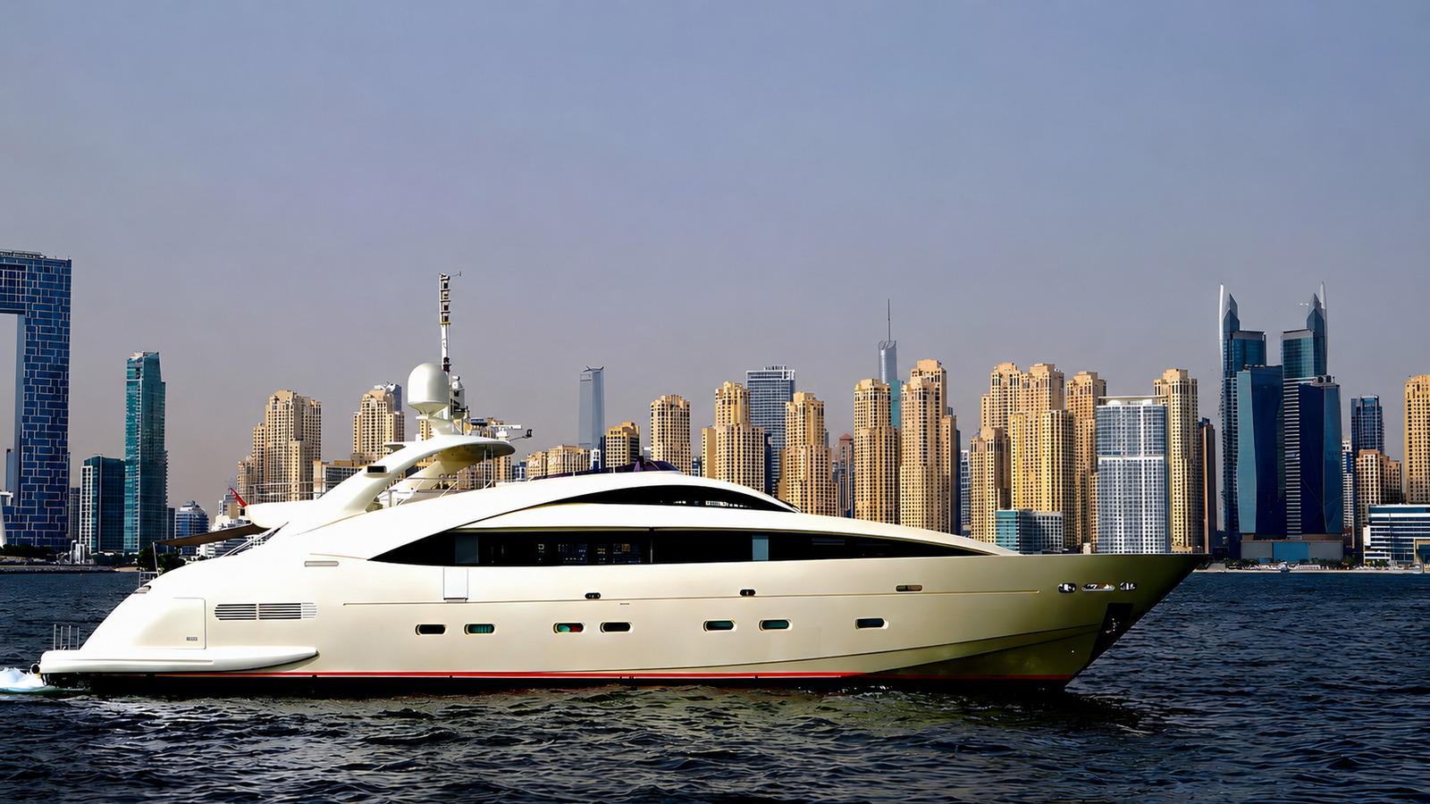 Front view of YRD Plan B of Freedom luxury yacht anchored against Dubai Marina skyline In Numbers — Y