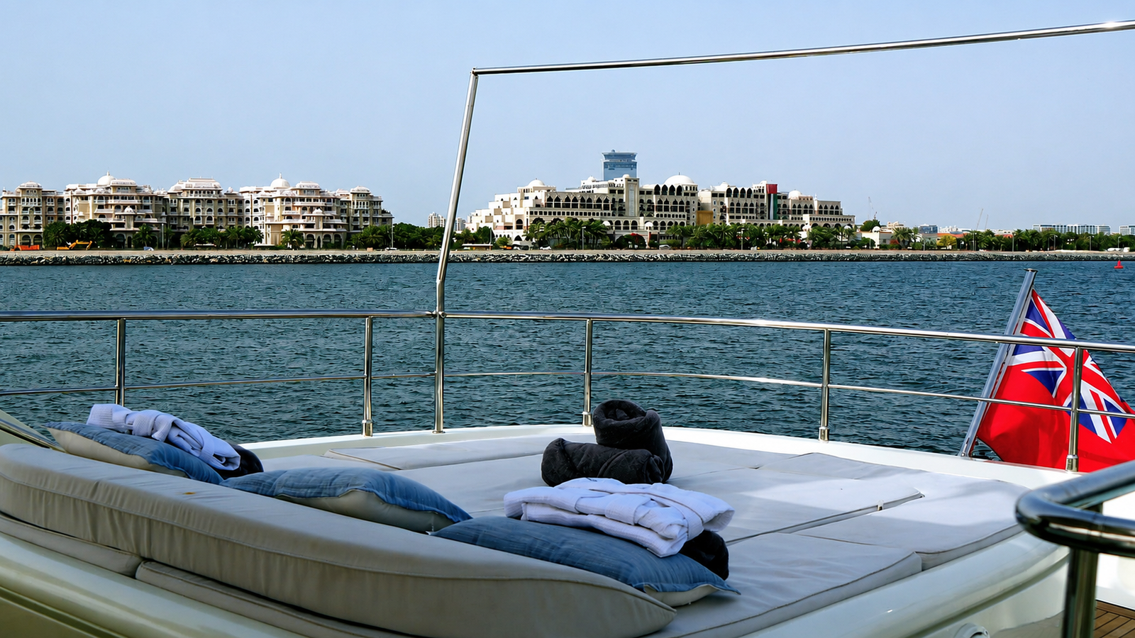 YRD Plan B of Freedom luxury yacht cruising past Ain Dubai and Dubai Marina towers